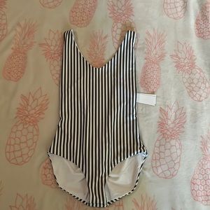 New with tags, Londre, one piece rouched bottom.